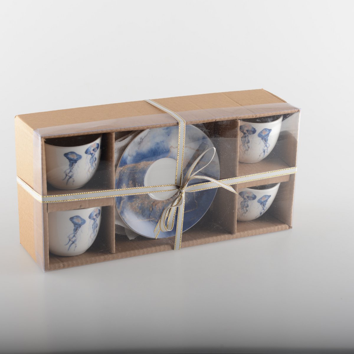 SET AUS 4 KAFFEETASSEN MIT MEDUSE-UNTERTASSE